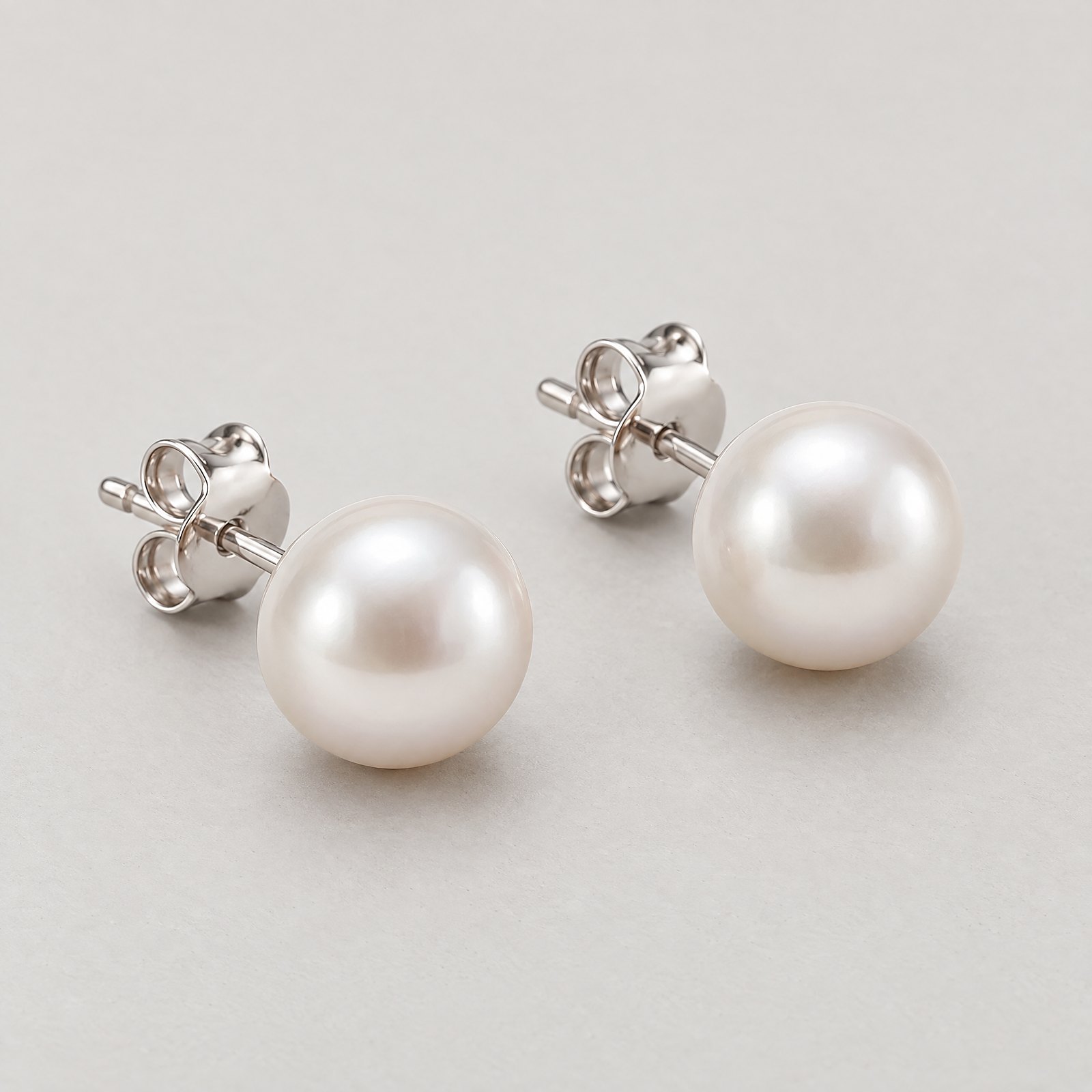 Pearl Studs in white gold â angled view